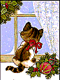 Christmas kitten sitting at a window